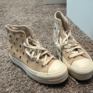 Platform Converse- Suede with embroidered multicolor flowers. Practically new